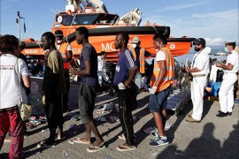 Migrants disembark from the rescue vessel Responder, a rescue boat run by the Malta-based NGO Migrant Offshore Aid Station (MOAS) and the Italian Red Cross (CRI), in the Italian harbour of Vibo Marina, Italy, October 22, 2016. Yara Nardi/Italian Red Cross press office/Handout via Reuters ATTENTION EDITORS - THIS IMAGE WAS PROVIDED BY A THIRD PARTY. EDITORIAL USE ONLY.