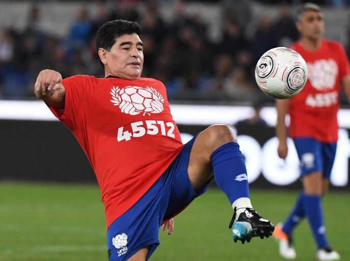 Argentinian soccer legend Diego Armando Maradona performs prior the 'Match of Peace - United for Peace', charity soccer match promoted by the Schools for Encounter foundation, an organization boosted by Pope Francis, at Olimpico stadium in Rome, Italy, 12 October 2016.