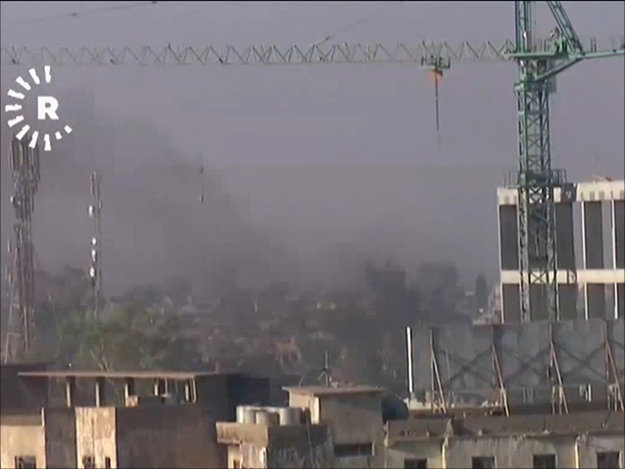 ‪(‬ اشتباكات تجري بين مقاتلي التنظيم وقوات الشرطة العراقية قرب مبنى المحافظةوكالات