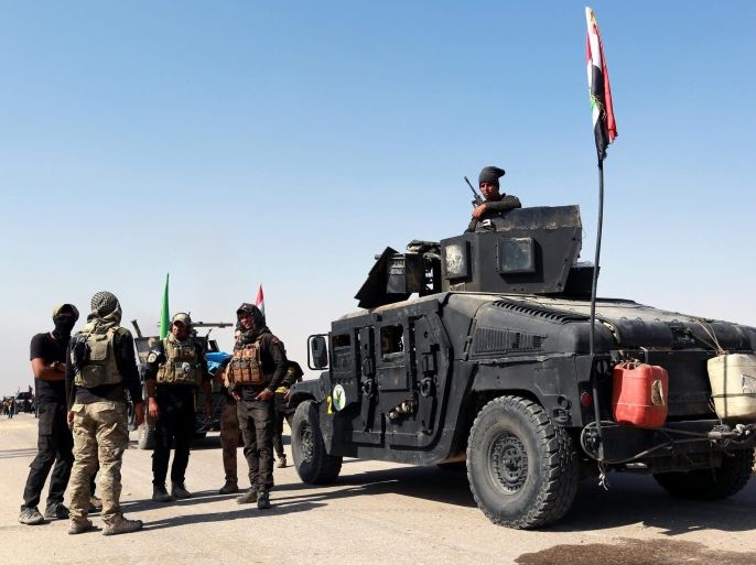 Members of Iraqi special forces take up position near Hamdaniyah town during a military operation to liberate several villages from the control of the so-called Islamic State (IS) militant group, east of Mosul, Iraq, 18 October 2016. Iraqi Prime Minister Haider al-Abadi said on 17 October that Iraqi forces started their military offensive to recapture the city of Mosul from IS. The operation, led by Kurdish Peshmerga, Iraqi government forces and allies, is backed by the