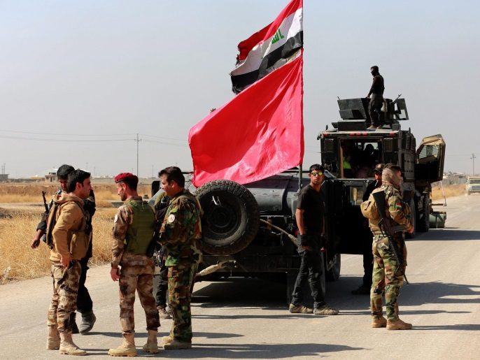 قوات عراقية خاصة قرب بلدة الحمدانية جنوب الموصل أثناء الهجوم على تنظيم الدولة (الأوروبية)