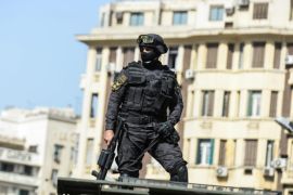 A police officer stands near Egyptian Journalists Syndicate, in Cairo, Egypt, 15 April 2016. Activists organised protests across the greater Cairo area against Egypt's acknowledgement that the two islands of Tiran and Sanafir in the Gulf of Aqaba belong to Saudi Arabia and had only been placed under Egypt's control temporarily.