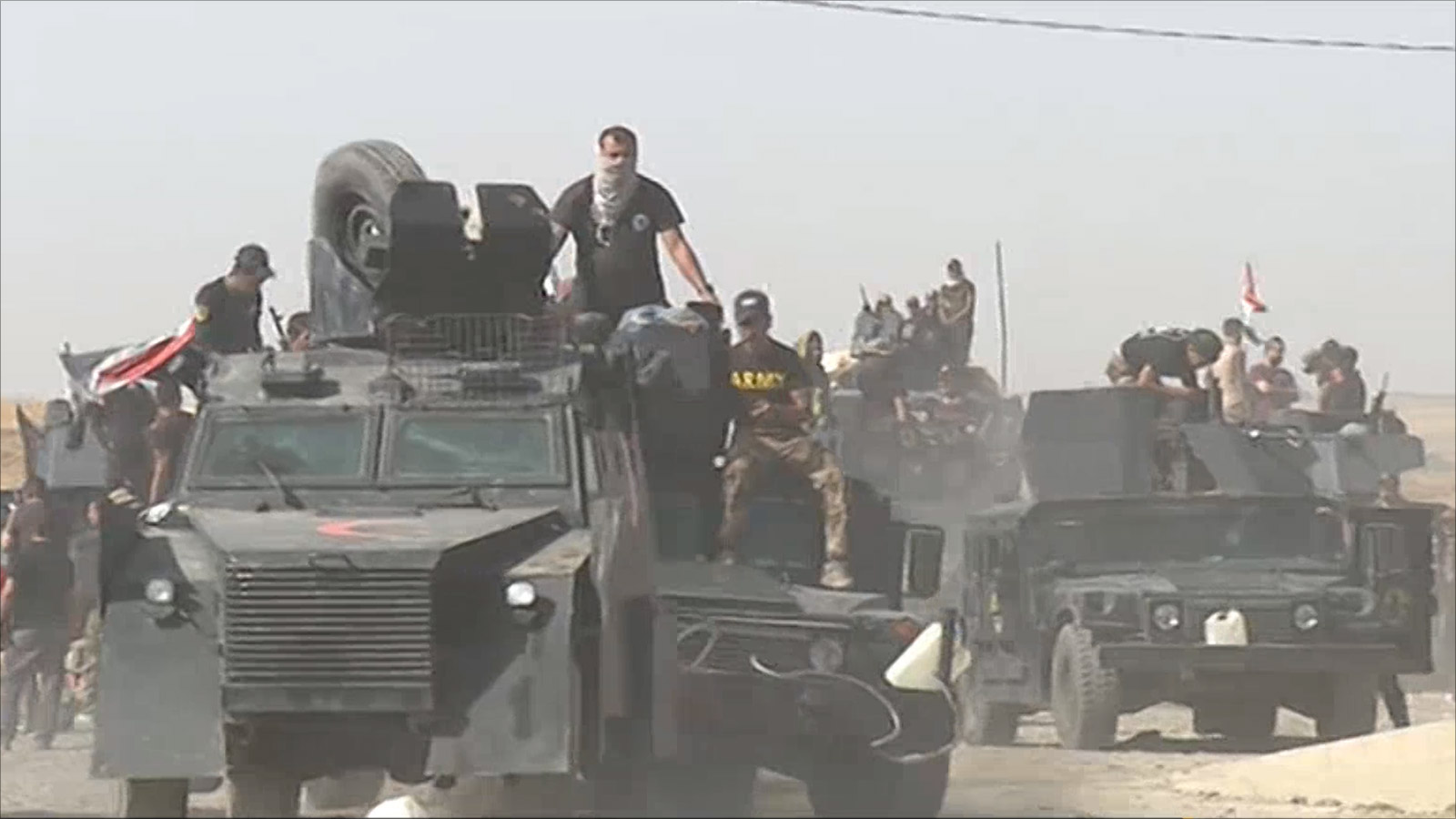 القوات العراقية تحتشد حول الموصل انتظارا لبدء المعركة ضد تنظيم الدولة (الجزيرة)