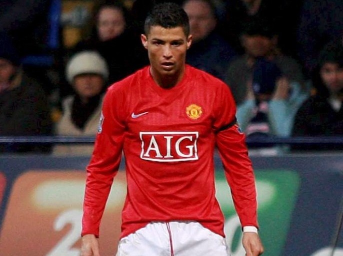epa01757858 (FILE) Manchester United's midfielder Cristiano Ronaldo during the English Premier League soccer match against Bolton Wanderers at the Reebok Stadium, Bolton, north west England on 17 January 2009. Manchester United accepted an 80-million-pound (131.7-million-dollar) bid from Real Madrid for winger Cristiano Ronaldo on 11 June 2009. A statement on the club‘s website said: "At Cristiano‘s request -who has again expressed his desire to leave - and after discussion with the player‘s representatives, United have agreed to give Real Madrid permission to talk to the player." EPA/STEVE WOODS NO ONLINE OR INTERNET USE WITHOUT A LICENCE FROM THE FOOTBALL DATA CO. LTD