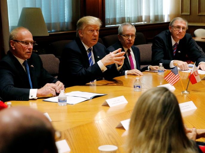 Republican presidential nominee Donald Trump (2nd L) meets with business leaders at the Polish National Alliance in Chicago, U.S. September 28, 2016. REUTERS/Jonathan Ernst