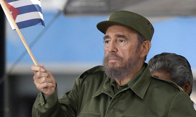 (FILE) A file picture dated 20 May 2005 shows Cuban President Fidel Castro waving the national flag after giving a speech in front of USA Interest Office in Havana, Cuba. According to a Cuban state TV broadcast, Cuban former President Fidel Castro has died at the age of 90 on 25 November 2016.