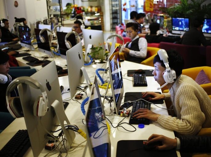 People use computers in an internet cafe in Beijing, China, 27 January 2015. China internet officials on 27 January 2015 defended its efforts to block virtual private networks (VPN), which are used to get around the country's strict internet controls. VPNs encrypt and reroute internet traffic past the national firewall to access more than 2,700 blocked websites including Gmail, Facebook and Youtube, websites of several human rights organizations, as well as some media