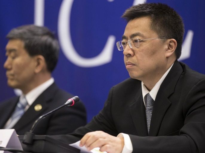 Chinese Assistant Minister of Commerce Zhang Xiangchen speaks during a news conference at the Joint Commission on Commerce and Trade event in Chicago December 18, 2014. REUTERS/Andrew Nelles (UNITED STATES - Tags: POLITICS BUSINESS)