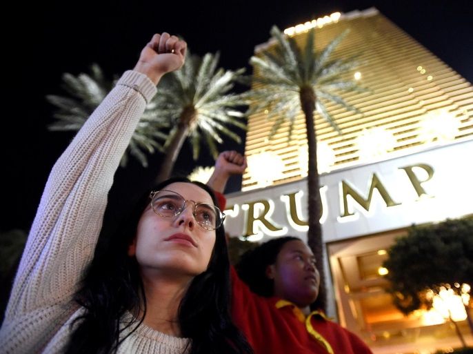 Demonstrators chant in protest against the election of Republican Donald Trump as President of the United States, at the Trump International Hotel & Tower in Las Vegas, Nevada, U.S. November12, 2016. REUTERS/David Becker TPX IMAGES OF THE DAY