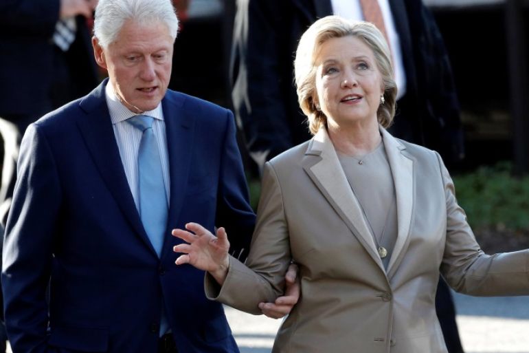 Democratic U.S. presidential nominee Hillary Clinton and her husband former U.S. president Bill Clinton depart after voting in the U.S. presidential election at the Grafflin Elementary School in Chappaqua, New York, U.S., November 8, 2016. REUTERS/Mike Segar