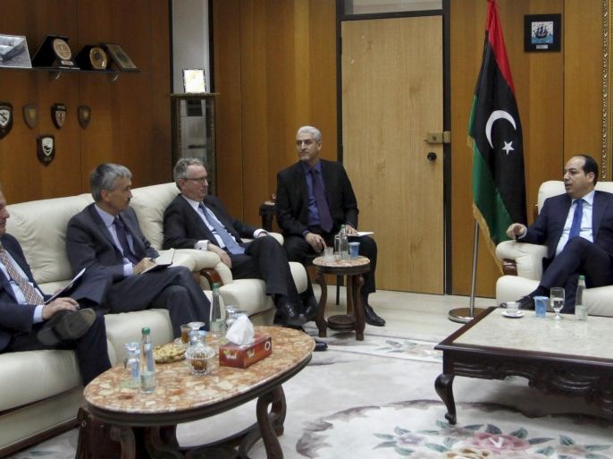 Britain's Ambassador to Libya Peter Millett, France's Ambassador to Libya Antoine Sivan and Spain's Ambassador to Libya Jose Antonio Bordallo talk to Ahmed Maiteeq, member of the Presidential Council of Libya's Government of National Accord, in Tripoli, Libya, April 14, 2016. REUTERS/Ismail Zitouny