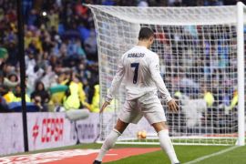 Real Madrid's Portuguese striker Cristiano Ronaldo celebrates after scoring a goal during the Spanish Primera Division soccer match between Real Madrid and Sporting Gijon at Santiago Bernabeu Stadium in Madrid, Spain, 26 November 2016.