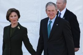 (L-R) Former US First Lady Laura Bush and former US President George W. Bush walk out before the President of the United States Barack Obama speaks during activities commemorating the 50th anniversary of the Bloody Sunday crossing of the Edmund Pettus Bridge in Selma, Alabama, USA, 07 March 2015. The weekend of civil rights activities also honors the Selma-to-Montgomery March and the Voting Rights Act of 1965.
