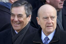 File photo shows former French prime ministers Francois Fillon (L) and Alain Juppe (R) as they attended an official funeral ceremony at the Hotel des Invalides in Paris, France, in this picture taken March 8, 2016. Alain Juppe and Francois Fillon are the top two candidates after results in voting November 20, 2016 in the French center-right presidential primary election. Picture taken March 8, 2016. REUTERS/Charles Platiau/File Photo