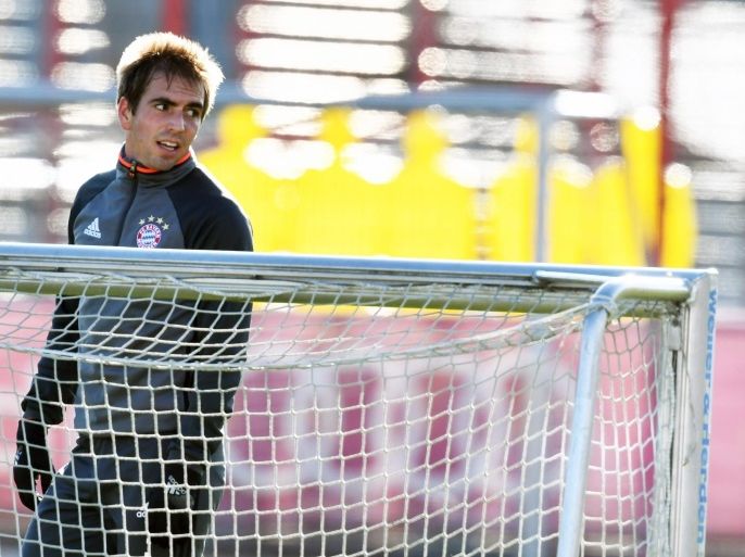 FC Bayern Munich player Philipp Lahm reacts during a training session at the club's grounds in Munich, Germany, 28 November 2016.