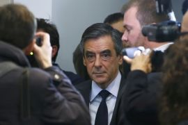 Francois Fillon (C), former French prime minister, arrives to meet Alain Juppe (not pictured) after the results in the second round for the French center-right presidential primary election in Paris, France, November 27, 2016. Fillon, a socially conservative free-marketeer, is to be the presidential candidate of the French centre-right in next year's election, according to partial results of a primaries' second-round vote showed on Sunday. REUTERS/Gonzalo Fuentes