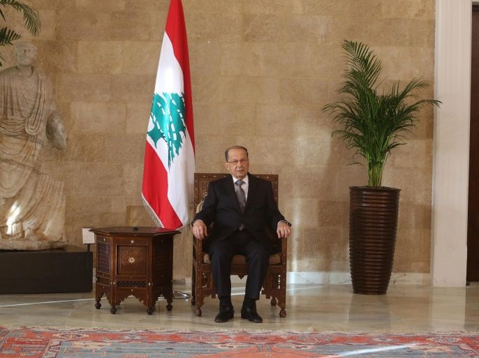Newly elected Lebanese president Michel Aoun sits on the president's chair inside the presidential palace in Baabda, near Beirut, Lebanon October 31, 2016. REUTERS/Aziz Taher