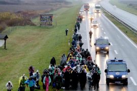 Hundreds of migrants march from Belgrade to Croatian border on the highway Belgrade-Zagreb near Pecinci 50km from Belgrade, Serbia, 12 November 2016. According to reports, hundreds of migrants from Middle East countries marched through the Serbian capital, apparently trying to move towards Croatia, in order to reach western European countries.