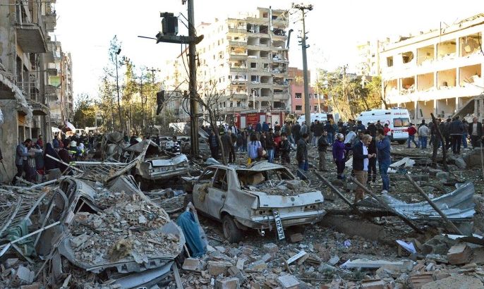 People look at debris caused by an explosion in Diyarbakir, Turkey, 04 November 2016. Media reports state that at least one person was killed and several others injured. The blast apparently targeting a police station was reported to have happened just hours after the arrest of the co-leaders of the pro-Kurdish and pro-minority political party Peoples' Democratic Party (HDP) Figen Yuksekdag and Selahattin Demirtas and at least nine other members of parliament as part o