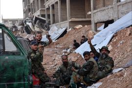 Syrian soldiers take a rest with their lunch after liberating the area of 1070 apartment in Aleppo province, Syria, 08 November 2016. According to media the Syrian army's control over the project in 1070 an apartment south-west city of Aleppo after fierce battles, by Syrian forces against the al-Father Army forces, where Syrian army heading for control of the Al Hekmeh and the Al-rashidine area and suburb Assad School.