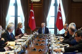 A handout picture provided by Turkish President Press office shows Turkish President Recep Tayyip Erdogan (C) meets with Federica Mogherini (5-L), High Representative of the European Union for Foreign Affairs, in Ankara, Turkey, 25 January 2016. EU top officials Mogherini and Hahn are in Turkey to attend a ministerial meeting on the crises in the Middle East. EPA/TURKISH PRESIDENT PRESS OFFICE / HANDOUT