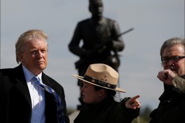 Republican U.S. presidential nominee Donald Trump (L) and campaign CEO Steve Bannon (R) listen to National Park Service Interpretive Park Ranger Caitlin Kostic on a brief visit to Gettysburg National Military Park, site of an important battle in July 1863 during the U.S. Civil war, in Gettysburg, Pennsylvania, U.S. October 22, 2016. REUTERS/Jonathan Ernst