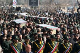 Members of the Iranian Revolutionary Guard carry the coffins of Iran's Revolutionary Guard Brigadier General Mohsen Ghajarian and other Iranian 'volunteers', who were reportedly killed in the northern province of Aleppo in the fight against the Islamic State (IS), during their funeral ceremony in the Tehran, Iran, 06 February 2016.