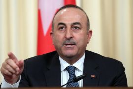 Turkish Foreign Minister Mevlut Cavusoglu gestures as he speaks at a press conference in Moscow 20 December, 2016. Russia, Iran and Turkey agreed to guarantee Syria peace talks and backed expanding a ceasefire in the war-torn country, Russian foreign minister said after talks with counterparts.