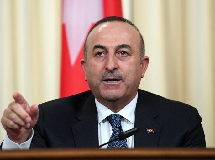 Turkish Foreign Minister Mevlut Cavusoglu gestures as he speaks at a press conference in Moscow 20 December, 2016. Russia, Iran and Turkey agreed to guarantee Syria peace talks and backed expanding a ceasefire in the war-torn country, Russian foreign minister said after talks with counterparts.