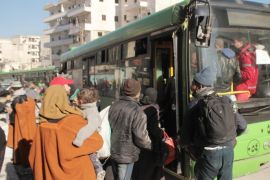 Residents get into busses which are part of a convoy evacuating civilians from the eastern part of Aleppo, Syria, 15 December 2016 (issued 16 December 2016). Evacuation of civilians from the rebel-held parts of Aleppo were suspended according to news reports on 16 December 2016. Aleppo's residents have been under siege for weeks and have suffered bombardment, together with chronic food and fuel shortages.