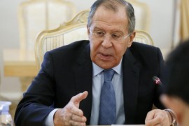 Russian Foreign Minister Sergei Lavrov (L) talks to his Japanese counterpart Fumio Kishida (R, back to camera) during their meeting in the Foreign Ministry's guest house in Moscow, Russia, 03 December 2016. The two ministers met to prepare the Russian President's planned visit to Japan.