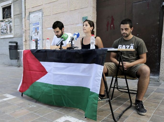 Members of the BDS's movement (Boycott, Disinvestment and Sanctions against Israel) Jorge Ramos, Blanca Castera and Carlos Marcos (L-R) attend a press conference in Valencia, Spain, 19 August 2015, to explain their position in the debate about the participation of US-Jewish singer Matisyahu in the Rototom Sunsplash festival. Concert organizers in Spain have backtracked on their decision to remove Matisyahu from their list of music festival acts after the artist refused