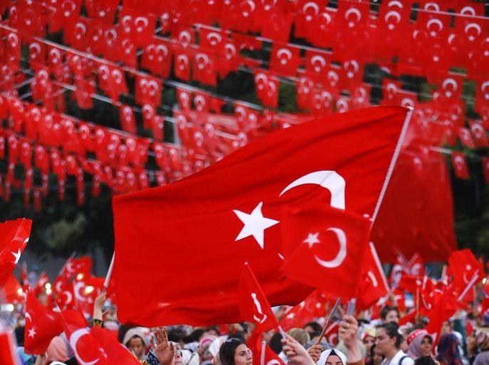 Supporters of Turkish President Recep Tayyip Erdogan hold Turkish flags during a rally in Gaziantep, Turkey 28 August 2016. Erdogan attended the rally, as Turkish army engaged in an offensive operation against IS in Syria's Jarablus with its war jets and army troops in coordination with the US led coalition war planes.