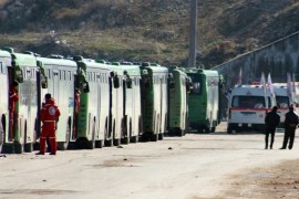 Busses and ambulances wait to evacuate fighters and their families from rebel-held zones in Aleppo, Syria, 15 December 2016. The evacuation of Aleppo began on 15 December as the first ambulances and buses extracted the sick and wounded from final rebel-held zones in the northern Syrian city, the Red Cross NGO said. Reports state the first batch of 951 gunmen and their families were evacuated via al-Ramouseh crossing to Aleppo southwestern countryside.