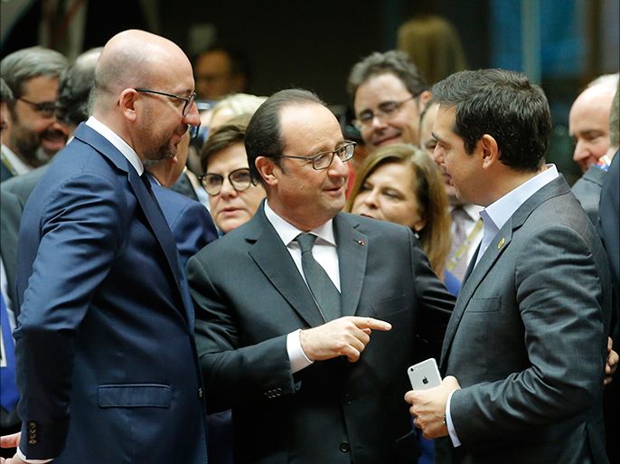 epa05676882 (L-R) Belgium's Prime Minister Charles Michel, French President Francois Hollande and Greek Prime Minister Alexis Tsipras chat during an European Summit in Brussels, Belgium, 15 December 2016. EU leaders meet for a one-day summit which will mainly focus on the implementation of the EU-Turkey agreement on migration and the EU Internal Security Strategy. The 27 leaders are later the same day scheduled to meet informally for a dinner to discuss the Brexit process. EPA/OLIVIER HOSLET