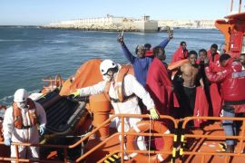 A group of ten Sub-Saharan immigrants arrive to the port of Tarifa after being rescued by Spanish Maritime Rescue Forces in the Strait of Gibraltar when they were trying to reach Spanish territory on board a small boat, in Tarifa, province of Cadiz, southern Spain, 17 November 2016.