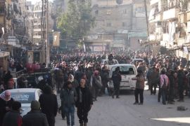 People walk in the streets of Aleppo, Syria, 15 December 2016 (issued 16 December 2016). Evacuation of civilians from the rebel-held parts of Aleppo were suspended according to news reports on 16 December 2016. Aleppo's residents have been under siege for weeks and have suffered bombardment, together with chronic food and fuel shortages.