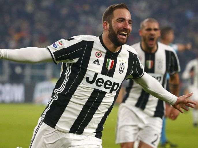 Football Soccer - Juventus v AS Roma - Italian Serie A - Juventus stadium,Turin, Italy - 17/12/16 - Juventus' Gonzalo Higuain reacts after scoring against AS Roma. REUTERS/Tony Gentile