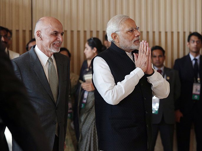epa05659035 Indian Prime Minister Narendra Modi (R) and President of Afghansitan Ashraf Ghani arrive for a group photograph before the inauguration of the 6th Heart of Asia (HoA) conference in Amritsar, India, 04 December 2016. The Indian Prime Minister Narendra Modi, President of Afghanistan, Ashraf Ghani and senior officials from 14 countries, including China and Pakistan are participating in the Heart of Asia (HoA) Conference from 03 to 04 December. HoA is a ministerial-level meeting and a multilateral conference to discuss peace, development and economic cooperation for the prosperity of Afghanistan. EPA/RAMINDER PAL SINGH
