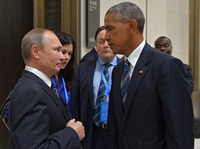 (FILE) - A file picture dated 05 September 2016 shows Russian President Vladimir Putin (L) talks to US President Barack Obama (R) during a meeting at the sidelines of the G20 Summit in Hangzhou, China. The USA on 29 December 2016 have ordered Russian diplomats to leave the country within 72 hours, a sanction that is aimed to punish an alleged cyberhack into the 2016 US presidential elections. EPA/ALEXEI DRUZHININ/SPUTNIK/KREMLIN MANDATORY CREDIT *** Local Caption *** 5