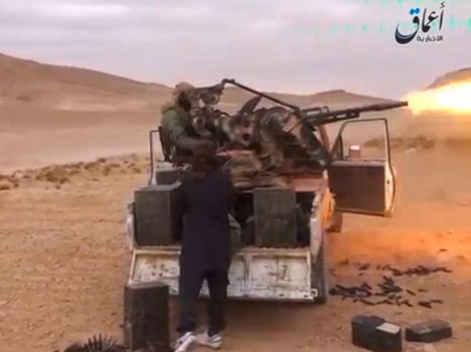 A still image taken on December 11, 2016 from a video released by Islamic State-affiliated Amaq news agency on December 10, 2016, purports to show Islamic State fighters advancing over the Hayan mountain south of Palmyra. Handout via REUTERS TV ATTENTION EDITORS - THIS IMAGE WAS PROVIDED BY A THIRD PARTY. EDITORIAL USE ONLY. NO RESALES. NO ARCHIVE. REUTERS IS UNABLE TO INDEPENDENTLY VERIFY THIS IMAGE TPX IMAGES OF THE DAY