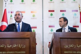 Turkish Minister for Foreign Affairs Mevluet Cavusoglu (L) and his Lebanese counterpart Gebran Bassil (R) speak at a joint news conference after their meeting in Beirut, Lebanon, 02 December 2016.