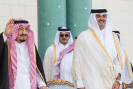 Saudi King Salman waves as he stands next to Qatar's Emir Sheikh Tamim Bin Hamad Al-Thani during a welcoming ceremony in Doha, Qatar December 5, 2016. Saudi Press Agency/Handout via REUTERS FOR EDITORIAL USE ONLY. NOT FOR SALE FOR MARKETING OR ADVERTISING CAMPAIGNS. MAGAZINES OUT. NOT FOR SALE TO MAGAZINE PUBLISHERS. NO ARCHIVES. NO SALES. THIS IMAGE HAS BEEN SUPPLIED BY A THIRD PARTY. IT IS DISTRIBUTED, EXACTLY AS RECEIVED BY REUTERS, AS A SERVICE TO CLIENTS