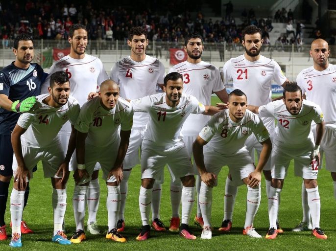 Tunisian players line up before the FIFA World Cup 2018 qualifying soccer match between Libya and Tunisia at Omar-Hamadi Stadium in Algiers, Algeria, 11 November 2016.