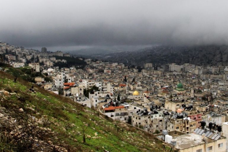 General view as low clouds hang over the city of Nablus, West Bank, 08 January 2015. Israelis and Palestinians along the coastline of the Mediterranean Sea and in Jerusalem are bracing themselves for incoming winter storm with strong winds and snowfalls in higher altitudes as many Middle Eastern countries experience extreme weather conditions.
