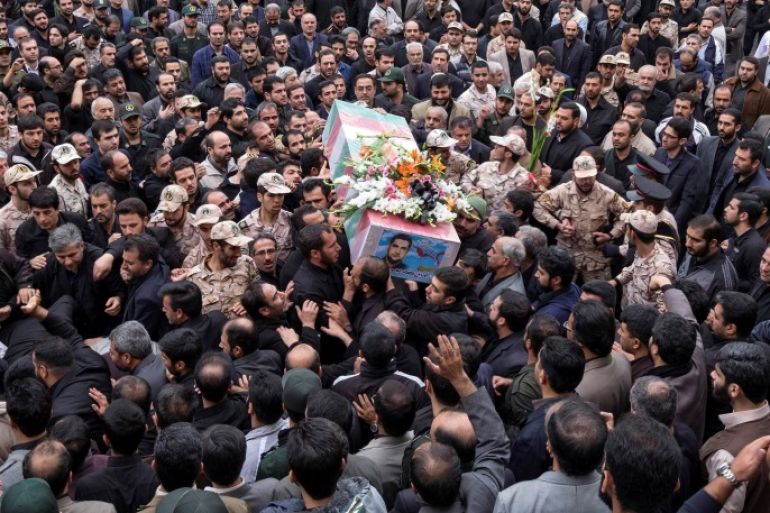Mourners carry the coffin of Amin Karimi, a member of Iranian Revolutionary Guards who was killed in Syria, during his funeral in Tehran October 28, 2015. REUTERS/Raheb Homavandi/TIMA/File Photo ATTENTION EDITORS - THIS IMAGE WAS PROVIDED BY A THIRD PARTY. FOR EDITORIAL USE ONLY.