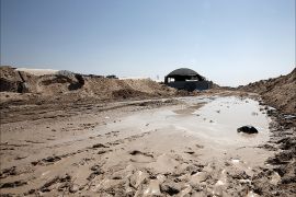 epa04938592 A puddle of water is seen next a tent above the entrance to a tunnel after Egyptian forces flooded smuggling tunnels beneath the border to the Gaza strip, in Rafah, southern Gaza Strip, 19 September 2015. The Egyptian army has begun to pump water from the Mediterranean Sea into underground smuggling tunnels connecting Sinai with the Gaza Strip, security officials and eye witnesses reported on 18 September 2015. Gaza, administered by the Islamic Hamas movement, remains under a tight blockade imposed by Israel and Egypt. EPA/MOHAMMED SABER