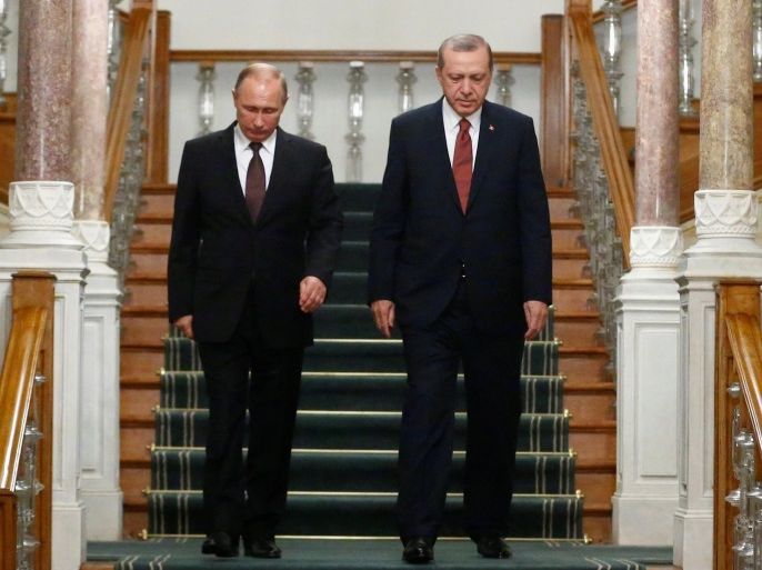Russian President Vladimir Putin (L) and his Turkish counterpart Tayyip Erdogan arrive for a news conference following their meeting in Istanbul, Turkey, October 10, 2016. REUTERS/Osman Orsal TPX IMAGES OF THE DAY