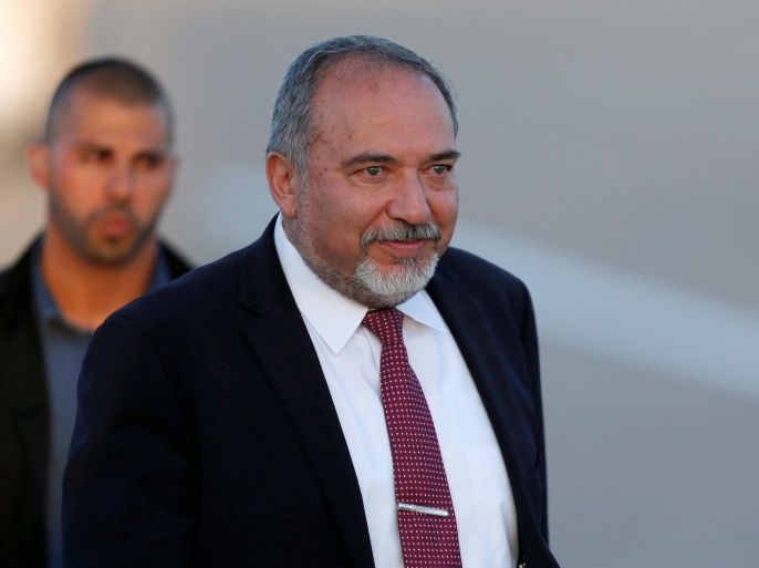 Israeli Defense Minister Avigdor Lieberman (C) is seen during a graduation ceremony for Israeli airforce pilots at the Hatzerim air base in southern Israel June 30, 2016. REUTERS/Amir Cohen