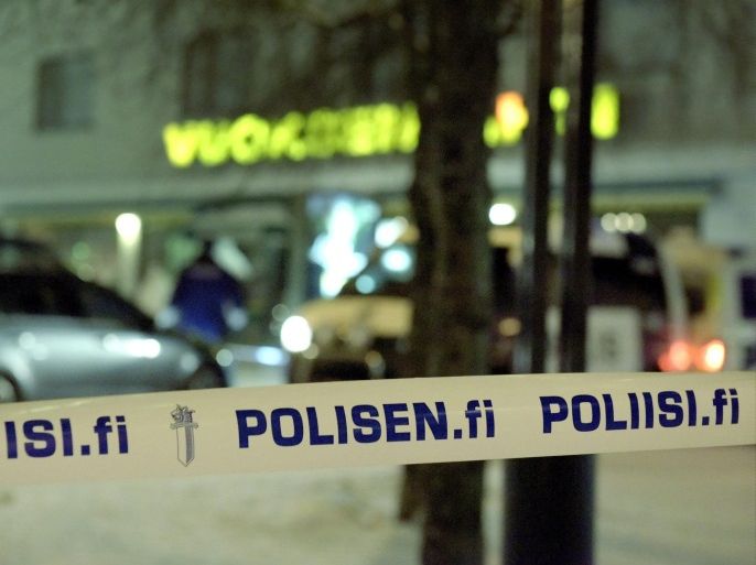 Police guards the area were three women were killed in a shooting incident outside of a restaurant in Imatra, Eastern Finland after midnight on December 4, 2016. Hannu Rissanen/Lehtikuva via REUTERS ATTENTION EDITORS - THIS IMAGE WAS PROVIDED BY A THIRD PARTY. FOR EDITORIAL USE ONLY. NOT FOR SALE FOR MARKETING OR ADVERTISING CAMPAIGNS. THIS PICTURE IS DISTRIBUTED EXACTLY AS RECEIVED BY REUTERS, AS A SERVICE TO CLIENTS. NO THIRD PARTY SALES. NOT FOR USE BY REUTERS THIRD PARTY DISTRIBUTORS. FINLAND OUT. NO COMMERCIAL OR EDITORIAL SALES IN FINLAND.